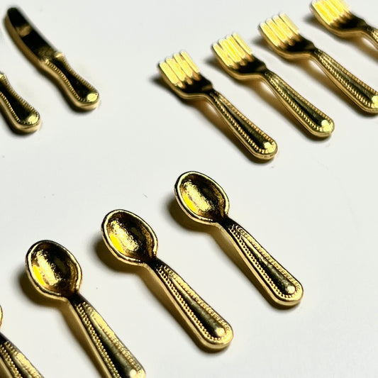 Besteck 12-teilig golden modern